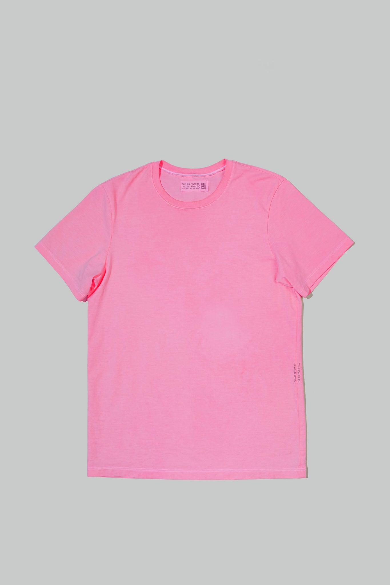 a crewneck in better barbie hot pink laid flat