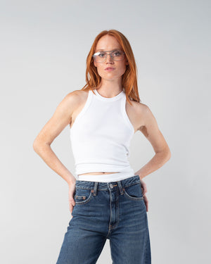 woman with red hair wearing the 90s tank in white