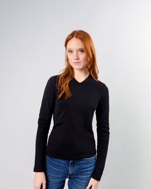 woman with red hair wearing the big favorite's micro vneck tee